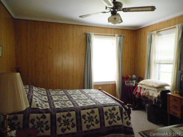 1007 Old Thompson Avenue Lancaster, SC 29720 - Photo 8 of 13 a bedroom with a bed and a window