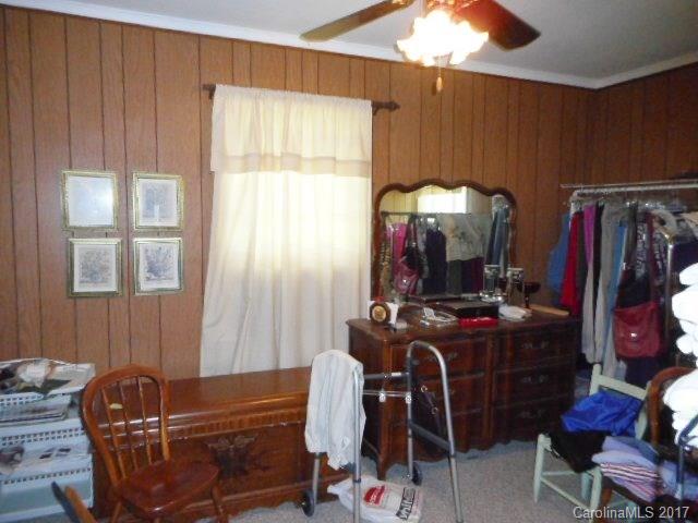 1007 Old Thompson Avenue Lancaster, SC 29720 - Photo 10 of 13 a room with furniture and musical instruments