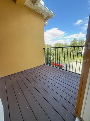 a view of lake with palm trees