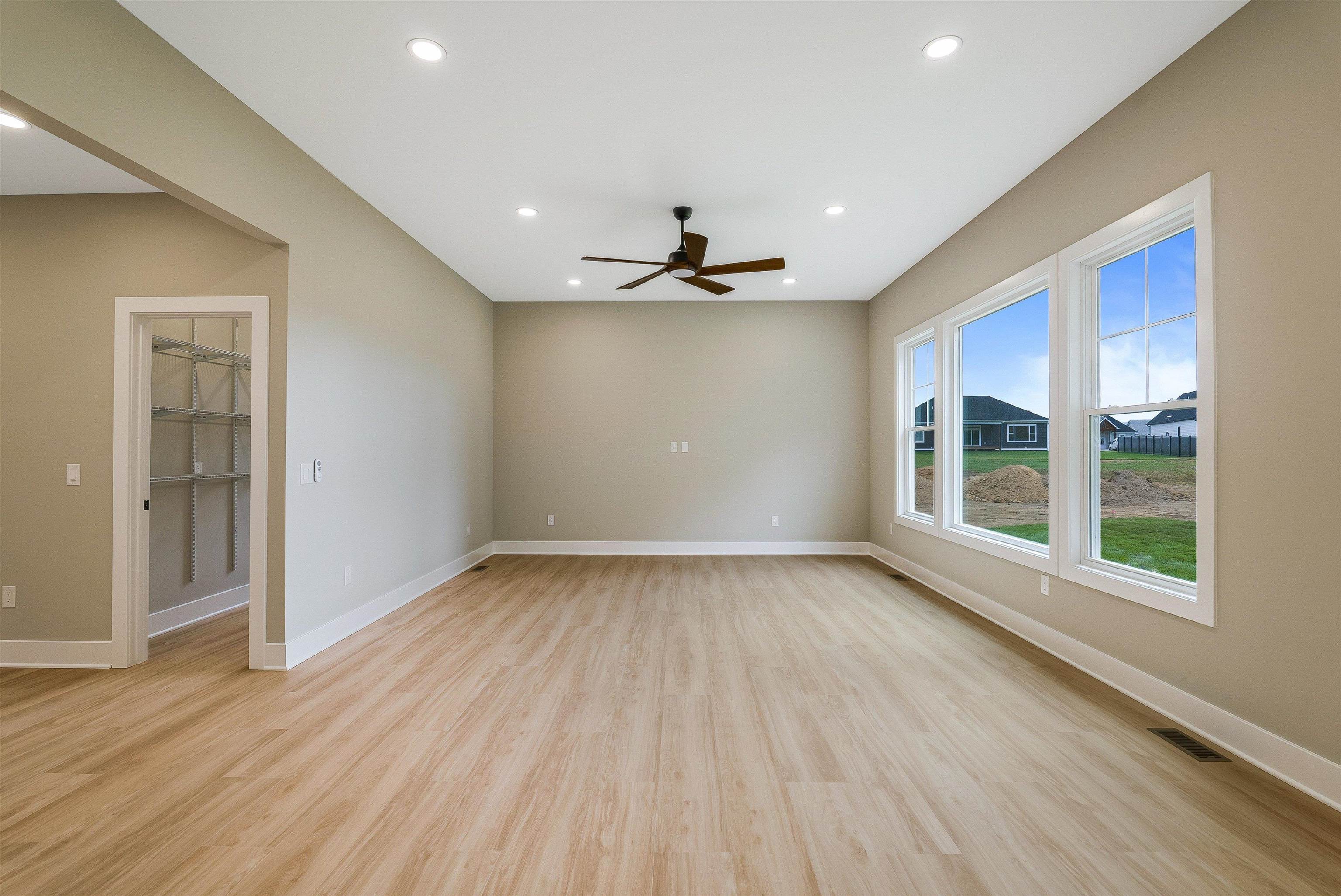 4935 Boxer Loop McGaheysville, VA 22840 - Photo 23 of 60 a view of an empty room with a window and wooden floor