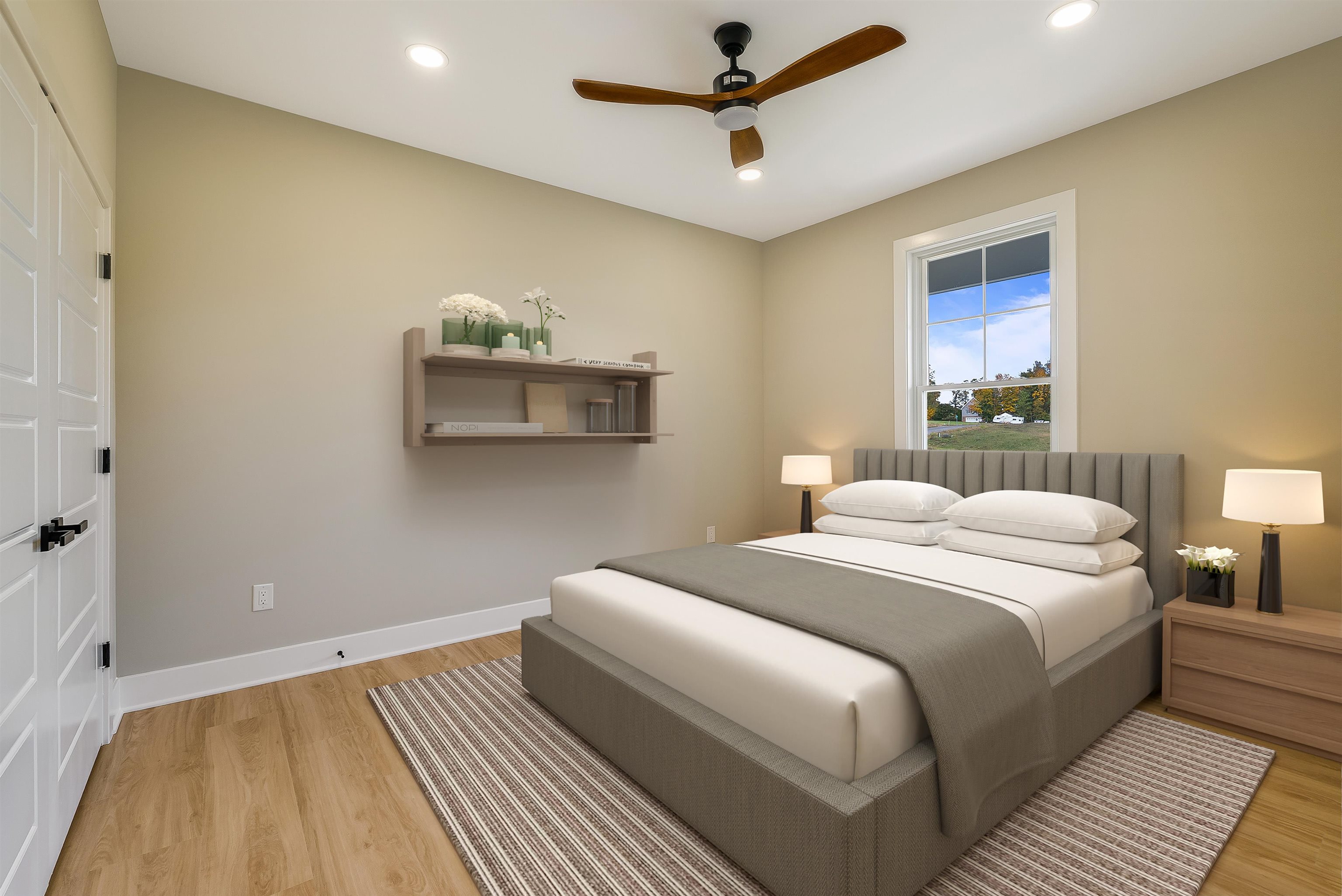 4935 Boxer Loop McGaheysville, VA 22840 - Photo 37 of 60 a bedroom with a bed and a lamp