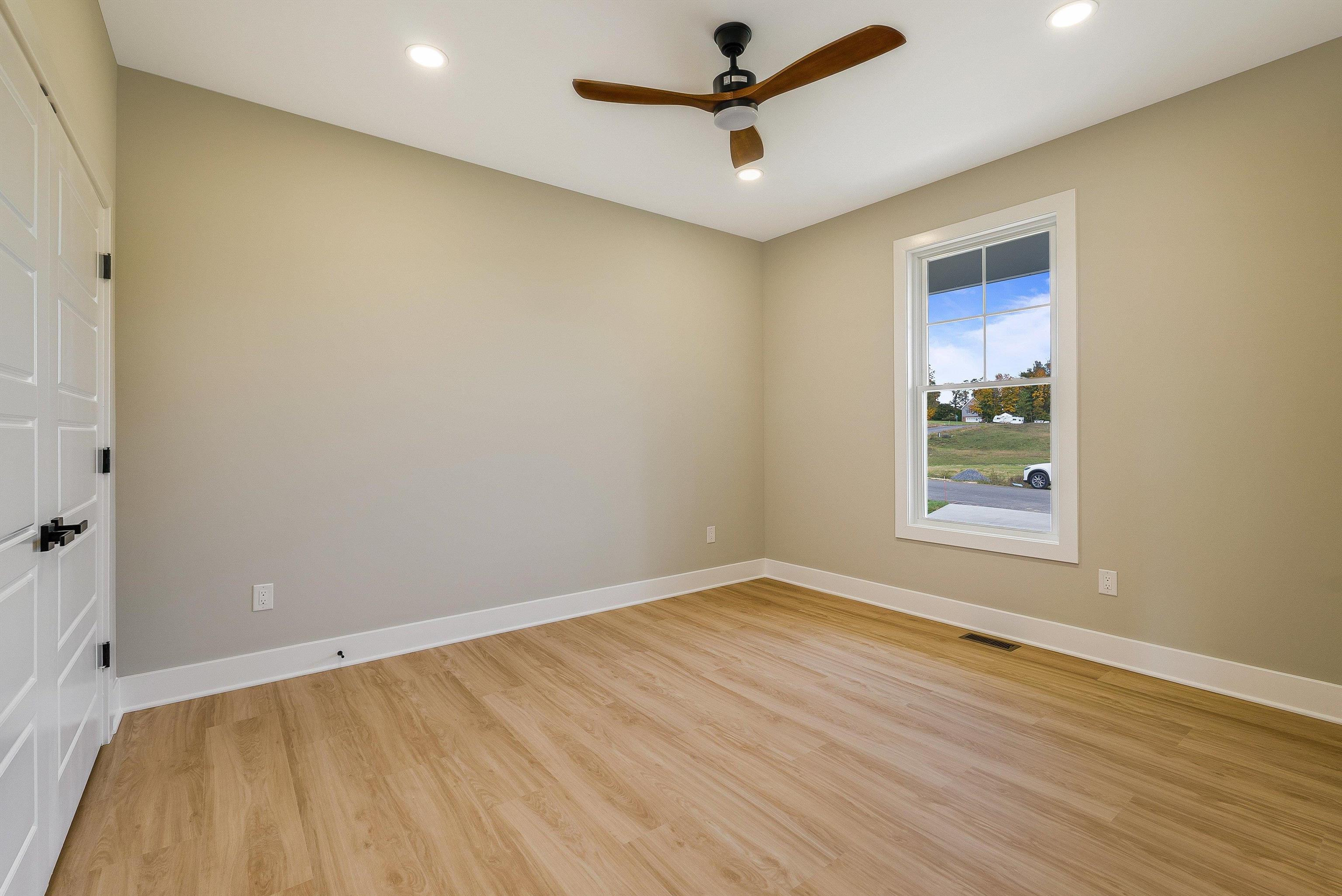 4935 Boxer Loop McGaheysville, VA 22840 - Photo 38 of 60 wooden floor in an empty room with a window