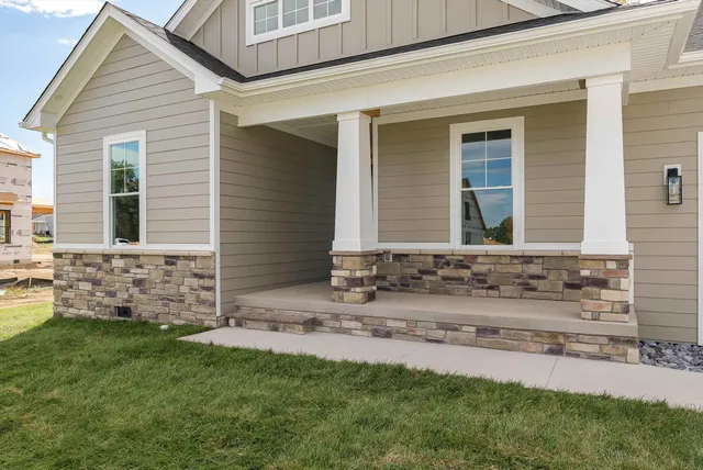 a view of a door and a window
