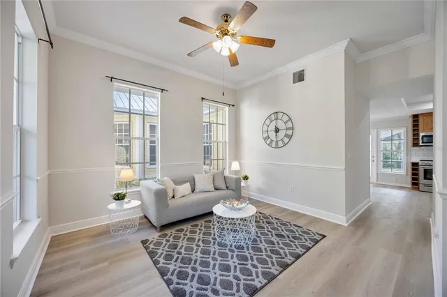 a living room with furniture and a window