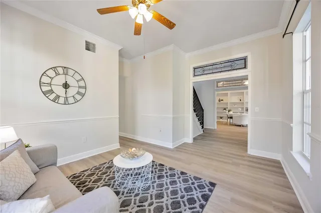 a living room with furniture and a window