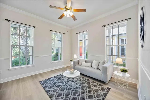 a living room with furniture and a window