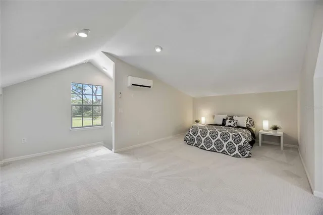 a view of a livingroom with stairs