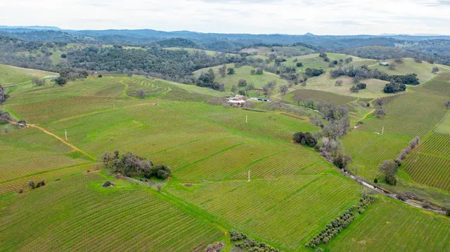 a view of a swimming pool with a lake view