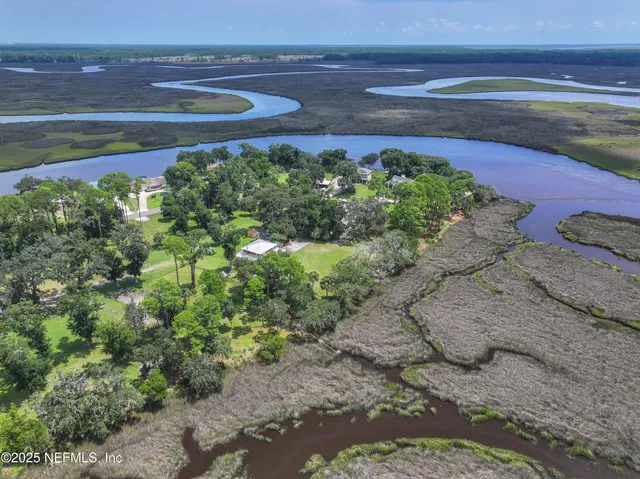 a view of a yard with an outdoor space