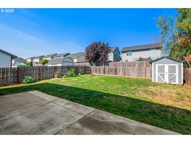 a house view with a garden space