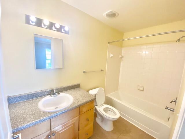 514 Wingspan Way Crestview, FL 32536 - Photo 15 of 20 a bathroom with a sink a toilet and shower