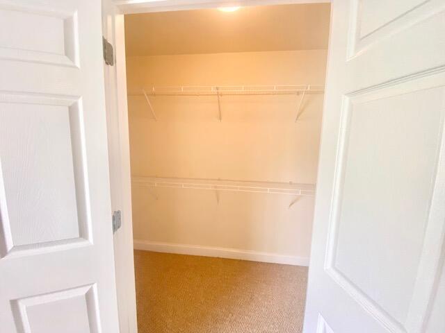 514 Wingspan Way Crestview, FL 32536 - Photo 17 of 20 a view of a small space with racks on the wall