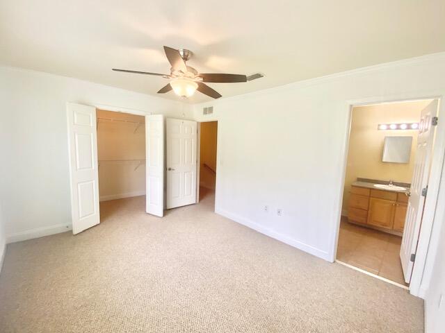 514 Wingspan Way Crestview, FL 32536 - Photo 18 of 20 an empty room with closet and a ceiling fan
