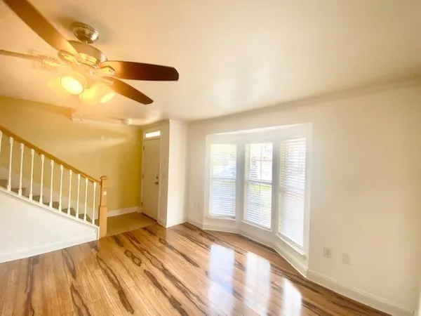 a view of an empty room and window