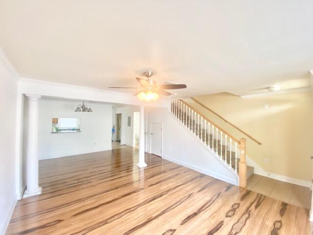 514 Wingspan Way Crestview, FL 32536 - Photo 3 of 20 a view of an empty room with wooden floor