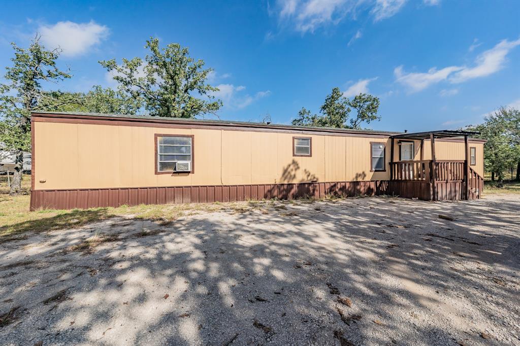 417 Wood River Road Millsap, TX 76066 - Photo 16 of 40 a view of a backyard of the house