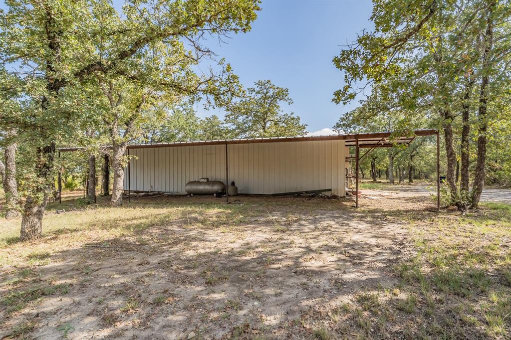 417 Wood River Road Millsap, TX 76066 - Photo 26 of 40 a view of a backyard