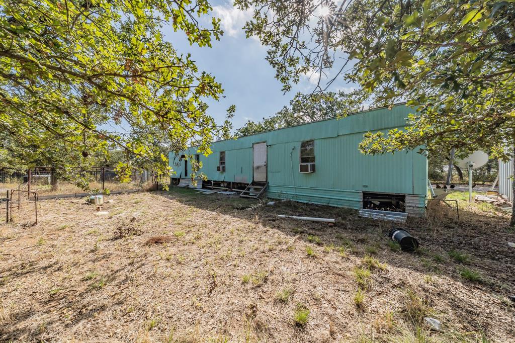 417 Wood River Road Millsap, TX 76066 - Photo 35 of 40 a view of backyard of the house