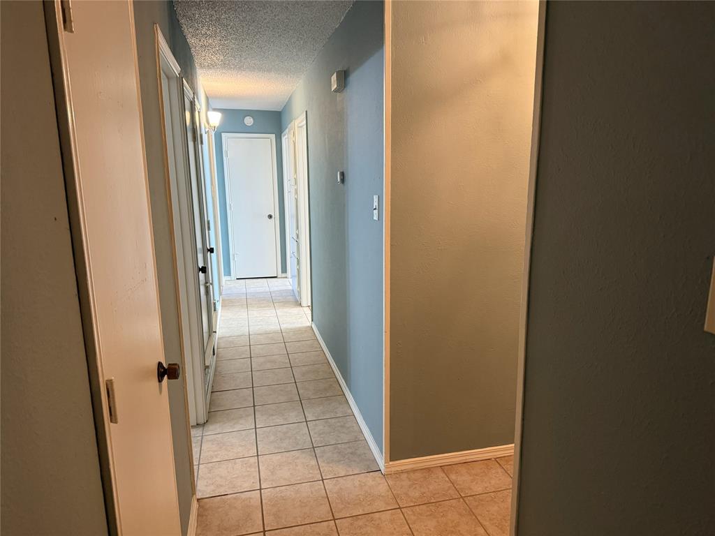 2414 March Lane Grand Prairie, TX 75050 - Photo 2 of 15 a view of a hallway