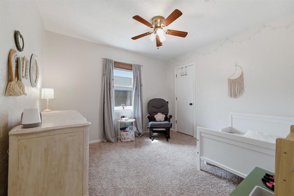 224 Overcrest Drive Benbrook, TX 76126 - Photo 26 of 39 a living room with furniture and a window