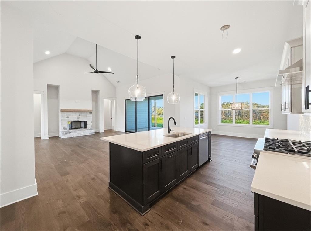 303 Eminence Peak Rydal, GA 30171 - Photo 30 of 73 a large kitchen with kitchen island a large island in it