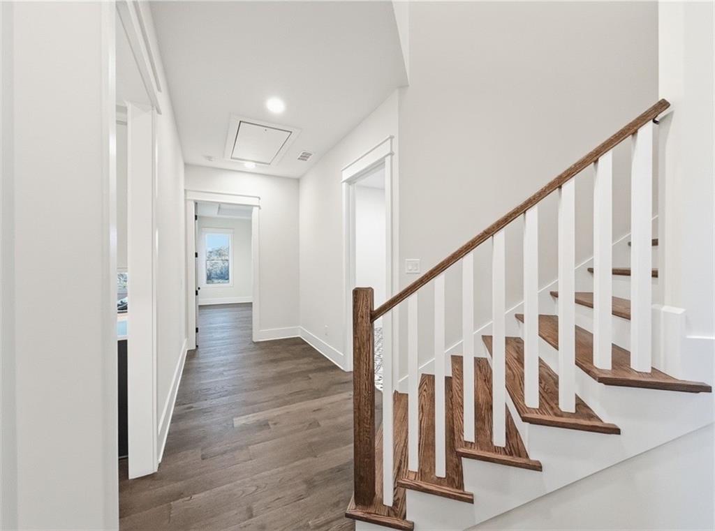 303 Eminence Peak Rydal, GA 30171 - Photo 54 of 73 a view of staircase with wooden floor and stairs