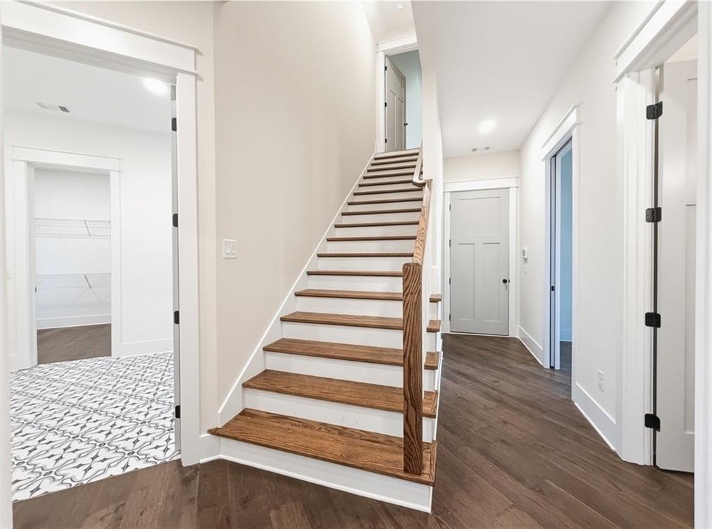 303 Eminence Peak Rydal, GA 30171 - Photo 64 of 73 a view of a hallway with wooden floor and entryway