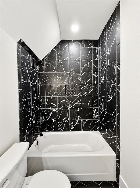 303 Eminence Peak Rydal, GA 30171 - Photo 69 of 73 a bathroom with a bathtub and a shower