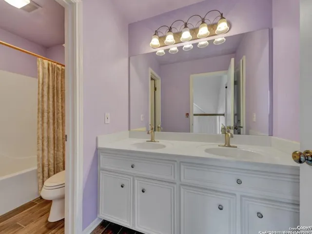 a view of a house with backyard and porch