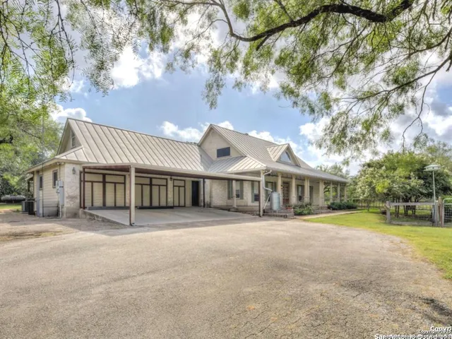 front view of a house with a big yard