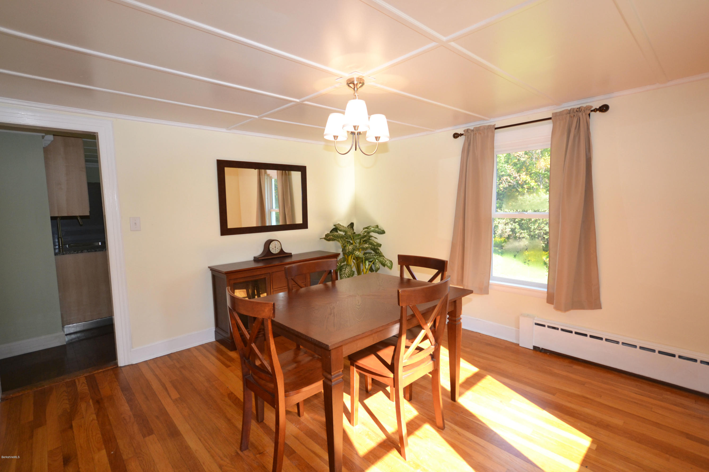 2127 Hancock Road Hancock, MA 01267 - Photo 11 of 53 a view of a dining room with furniture and window