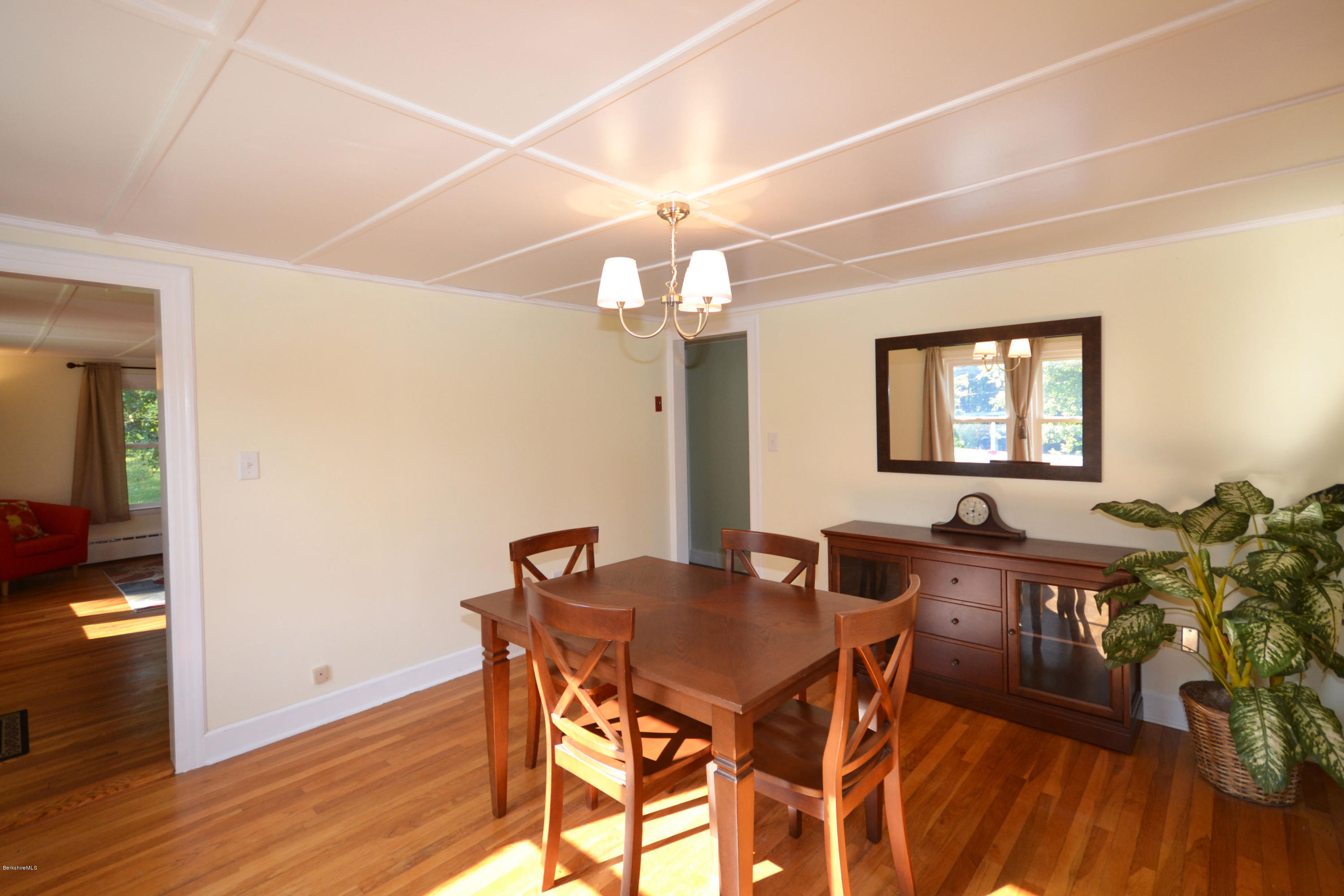 2127 Hancock Road Hancock, MA 01267 - Photo 12 of 53 a view of a dining room with furniture and wooden floor