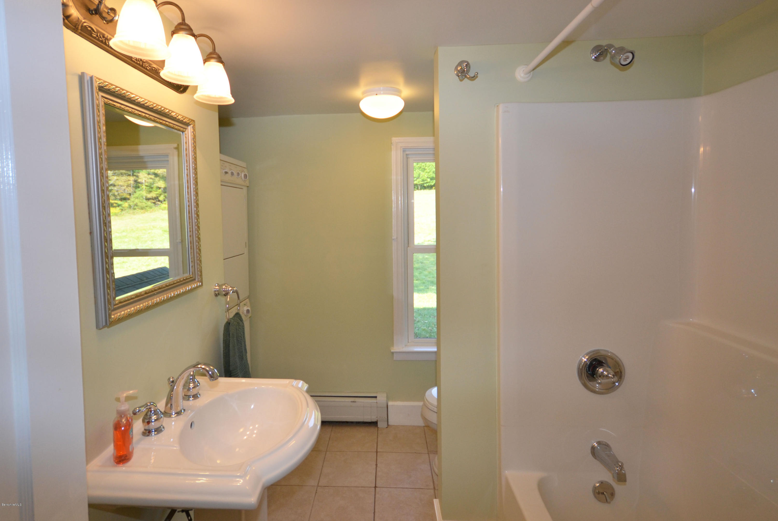 2127 Hancock Road Hancock, MA 01267 - Photo 22 of 53 a bathroom with a sink a toilet and shower