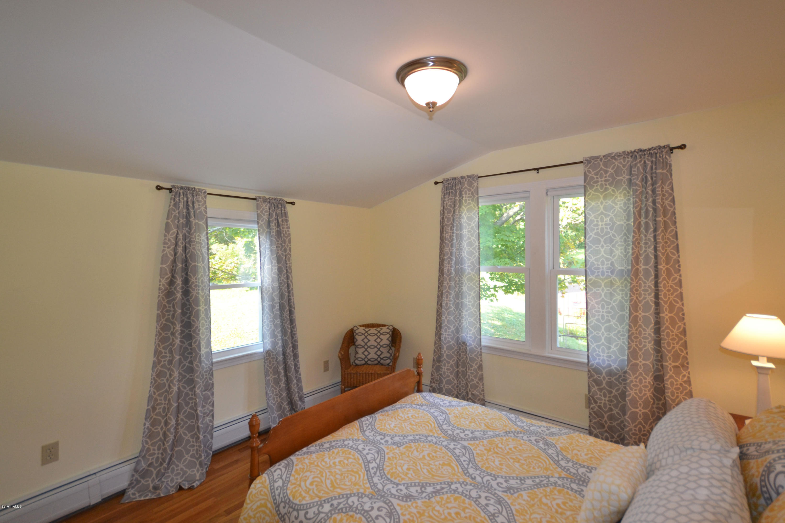 2127 Hancock Road Hancock, MA 01267 - Photo 28 of 53 a bedroom with a bed and a window