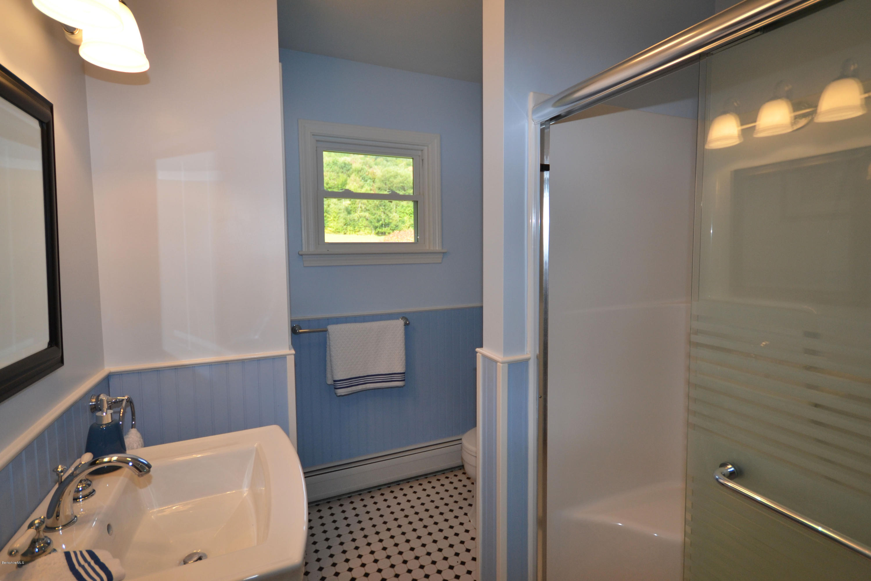 2127 Hancock Road Hancock, MA 01267 - Photo 35 of 53 a bathroom with a sink and a mirror