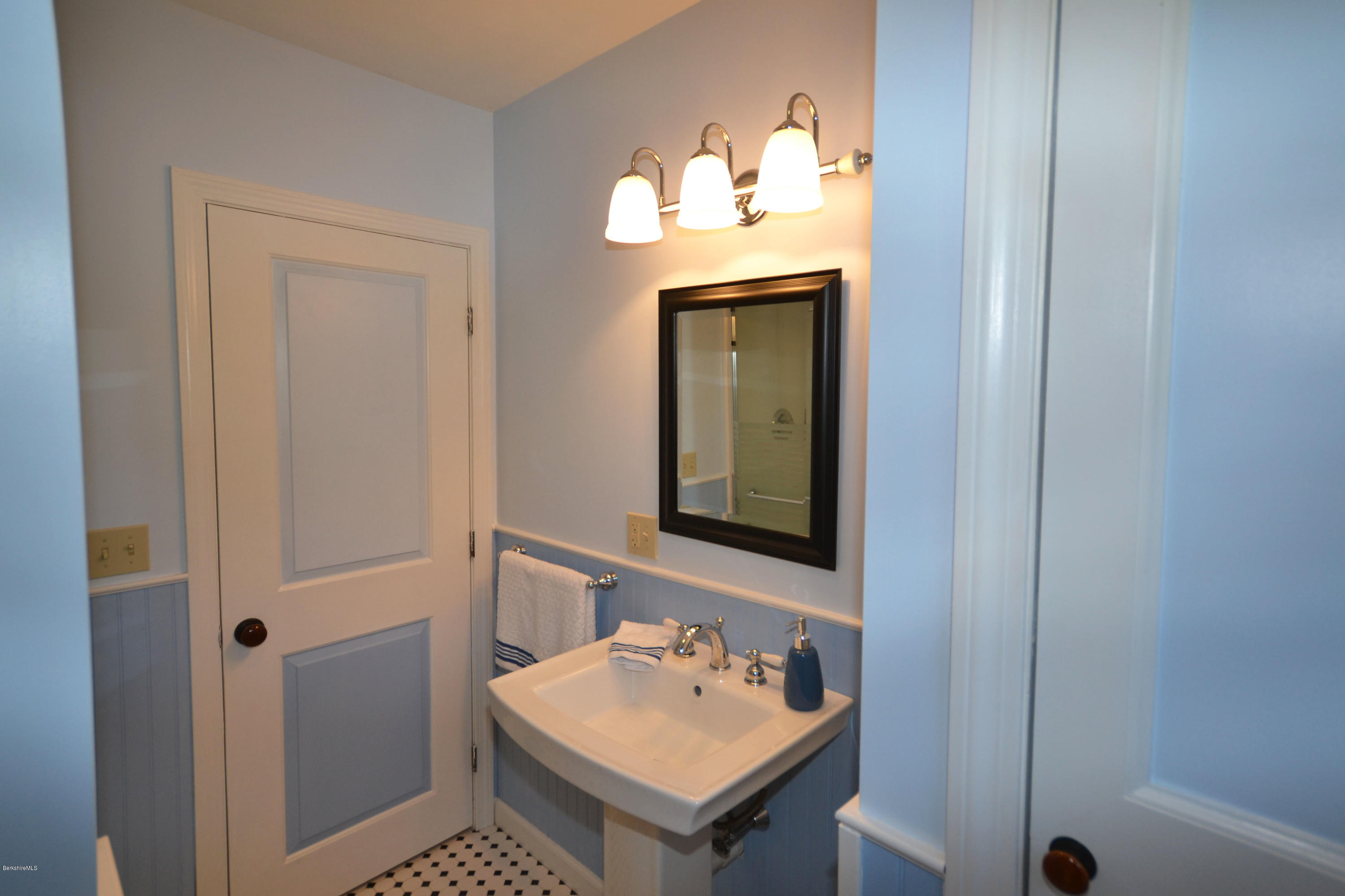 2127 Hancock Road Hancock, MA 01267 - Photo 37 of 53 a bathroom with a sink and a mirror