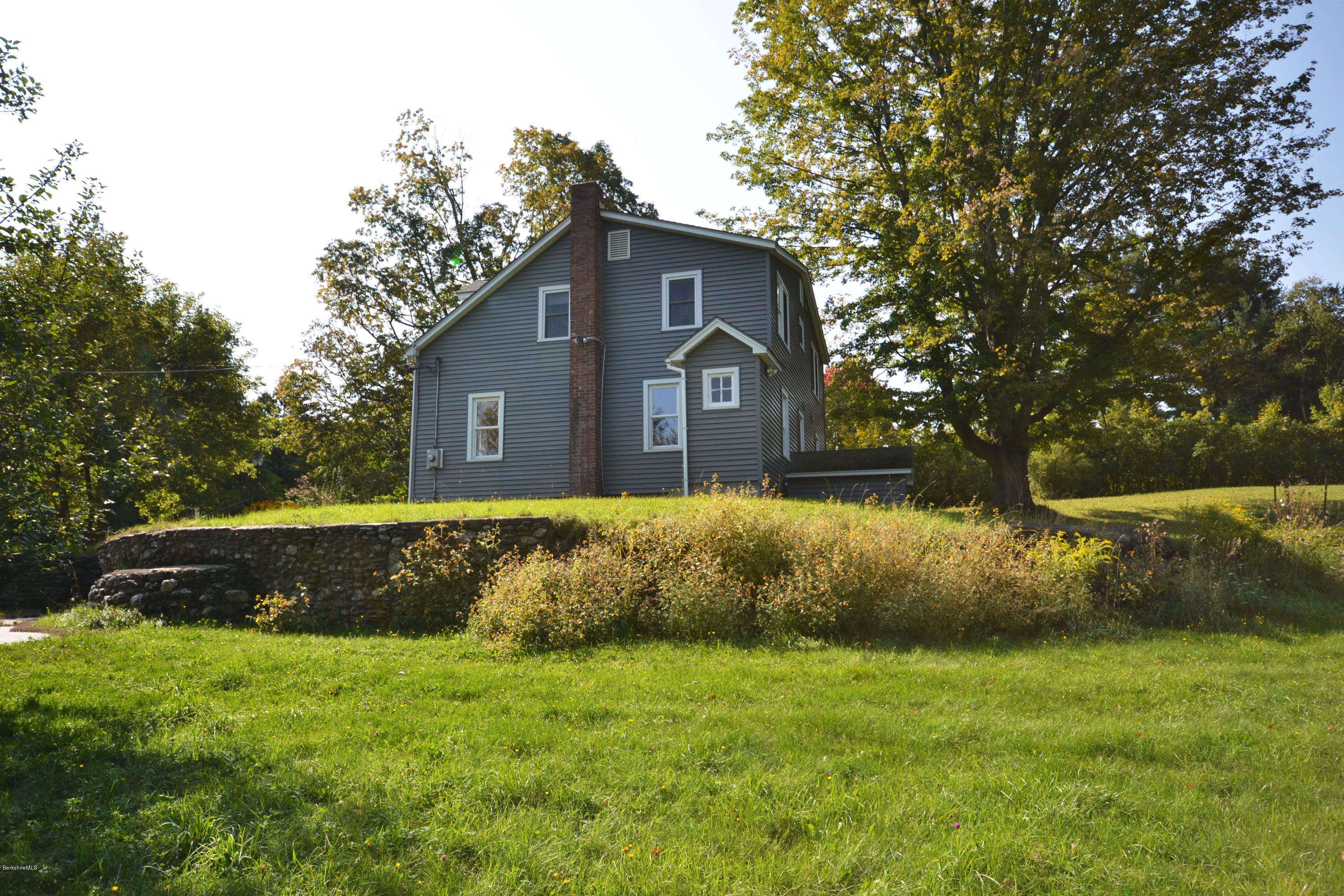 2127 Hancock Road Hancock, MA 01267 - Photo 39 of 53 a front view of a house with a garden