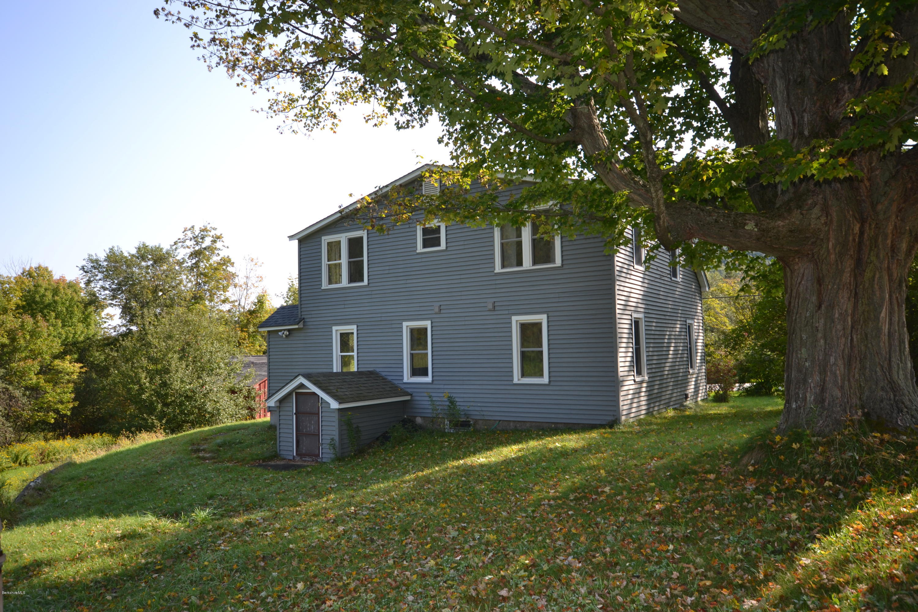 2127 Hancock Road Hancock, MA 01267 - Photo 42 of 53 a front view of a house with garden