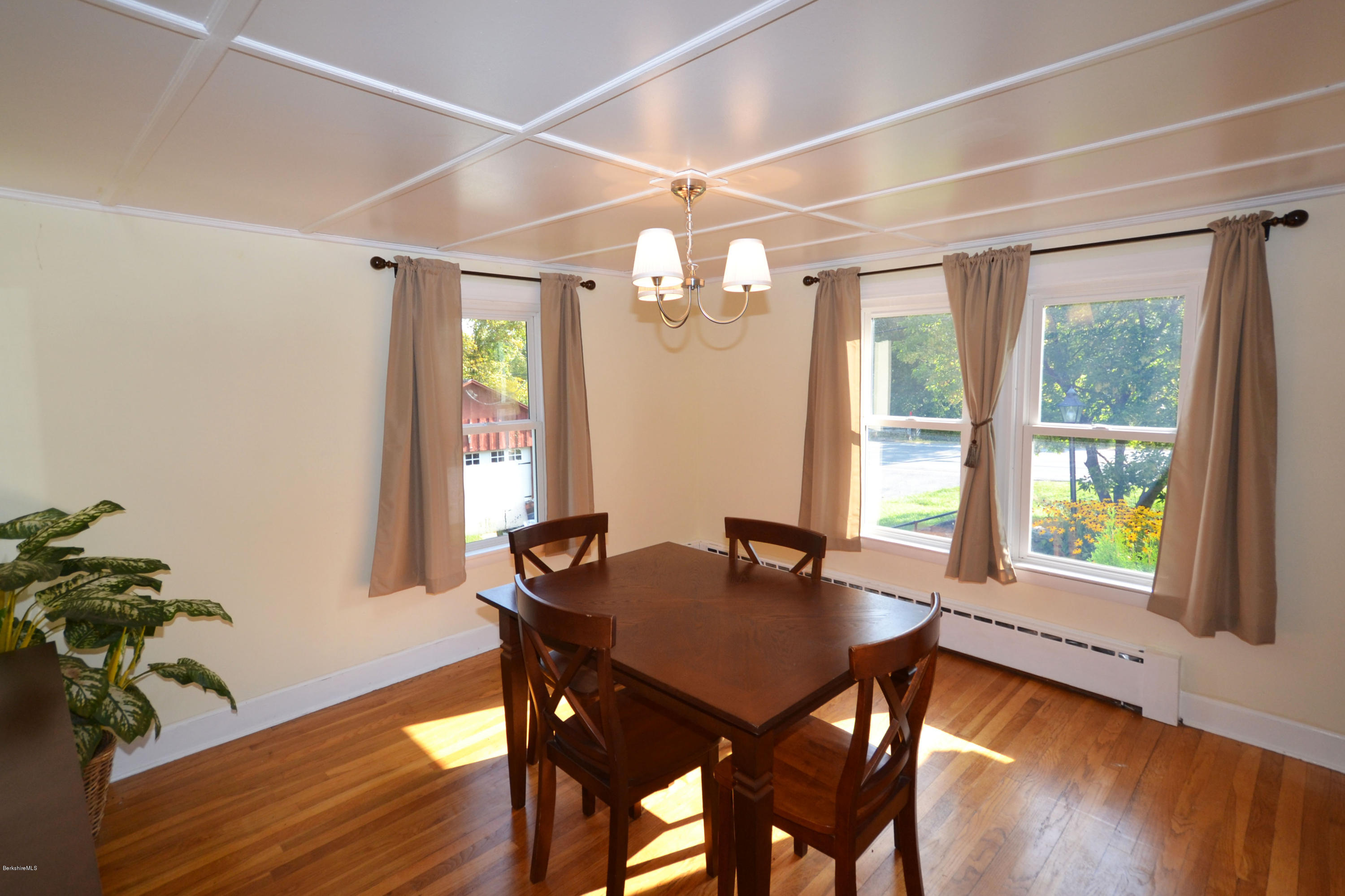 2127 Hancock Road Hancock, MA 01267 - Photo 10 of 53 a view of a dining room with furniture and wooden floor