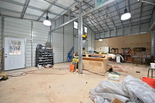 a room with lots of table and chairs