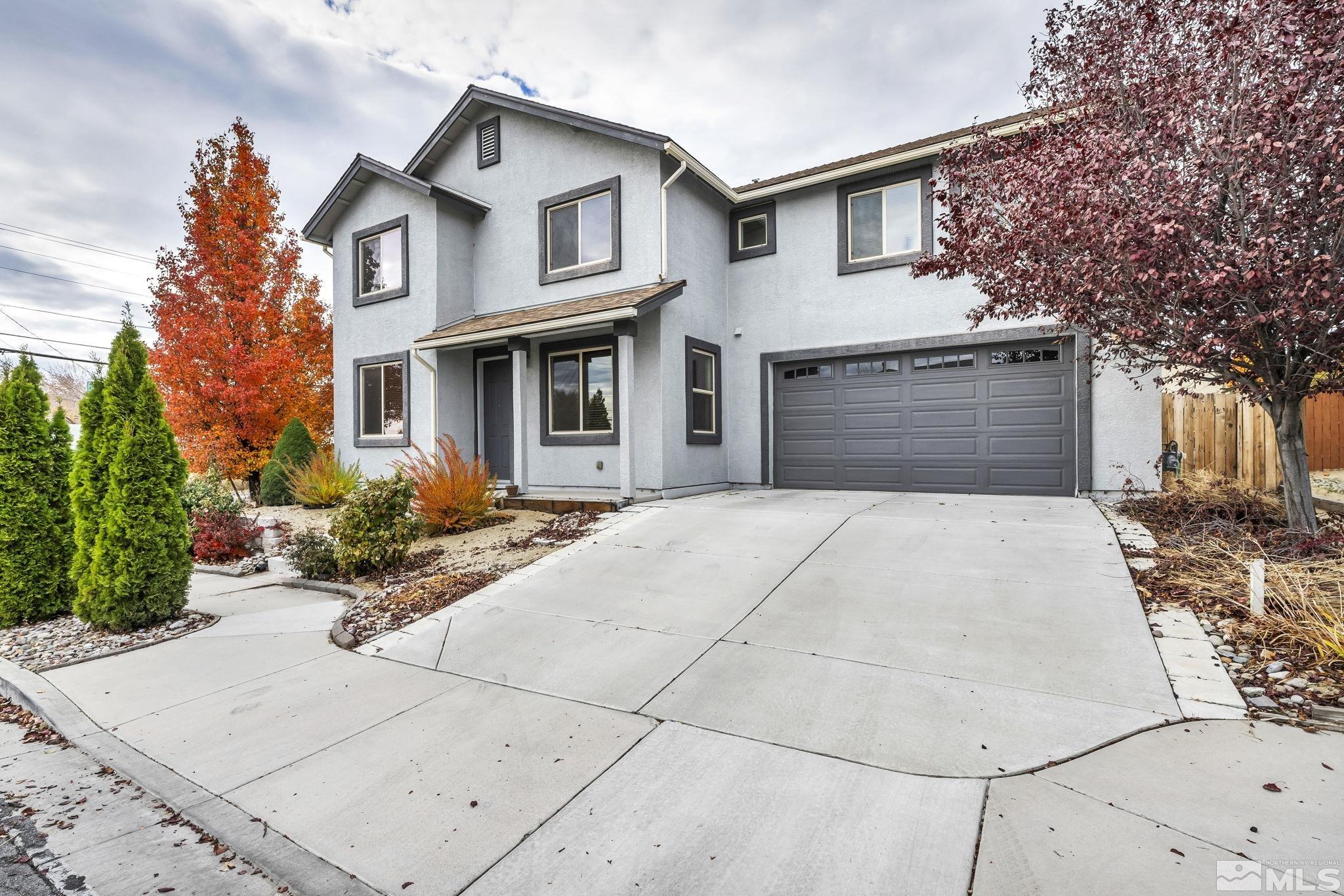 2705 Gulling Court Reno, NV 89503 - Photo 1 of 40 a front view of a house with yard and tress