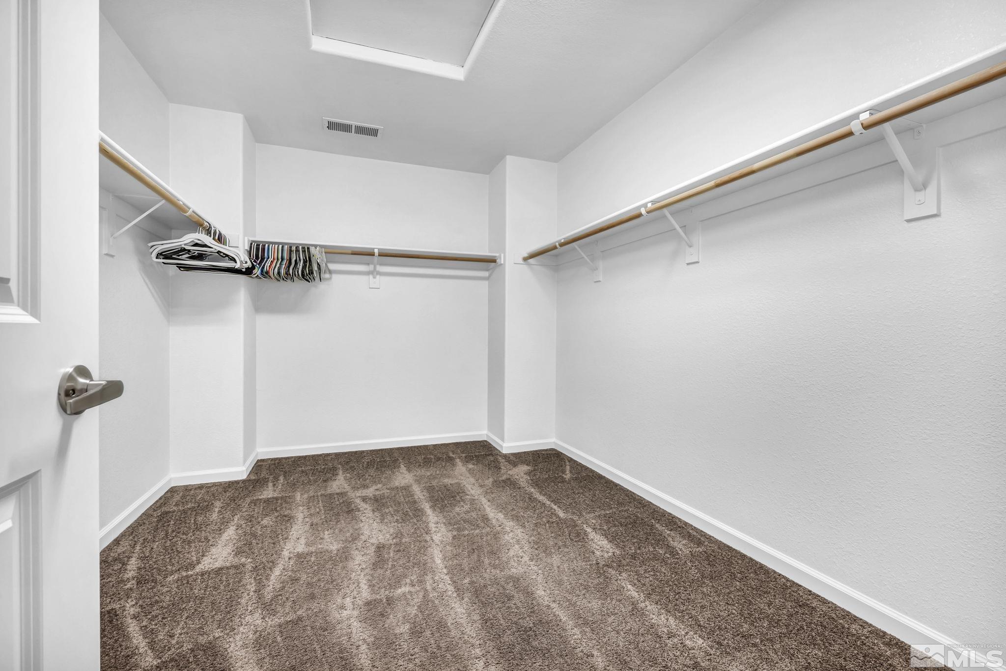 2705 Gulling Court Reno, NV 89503 - Photo 12 of 40 a view of a room with racks on the wall