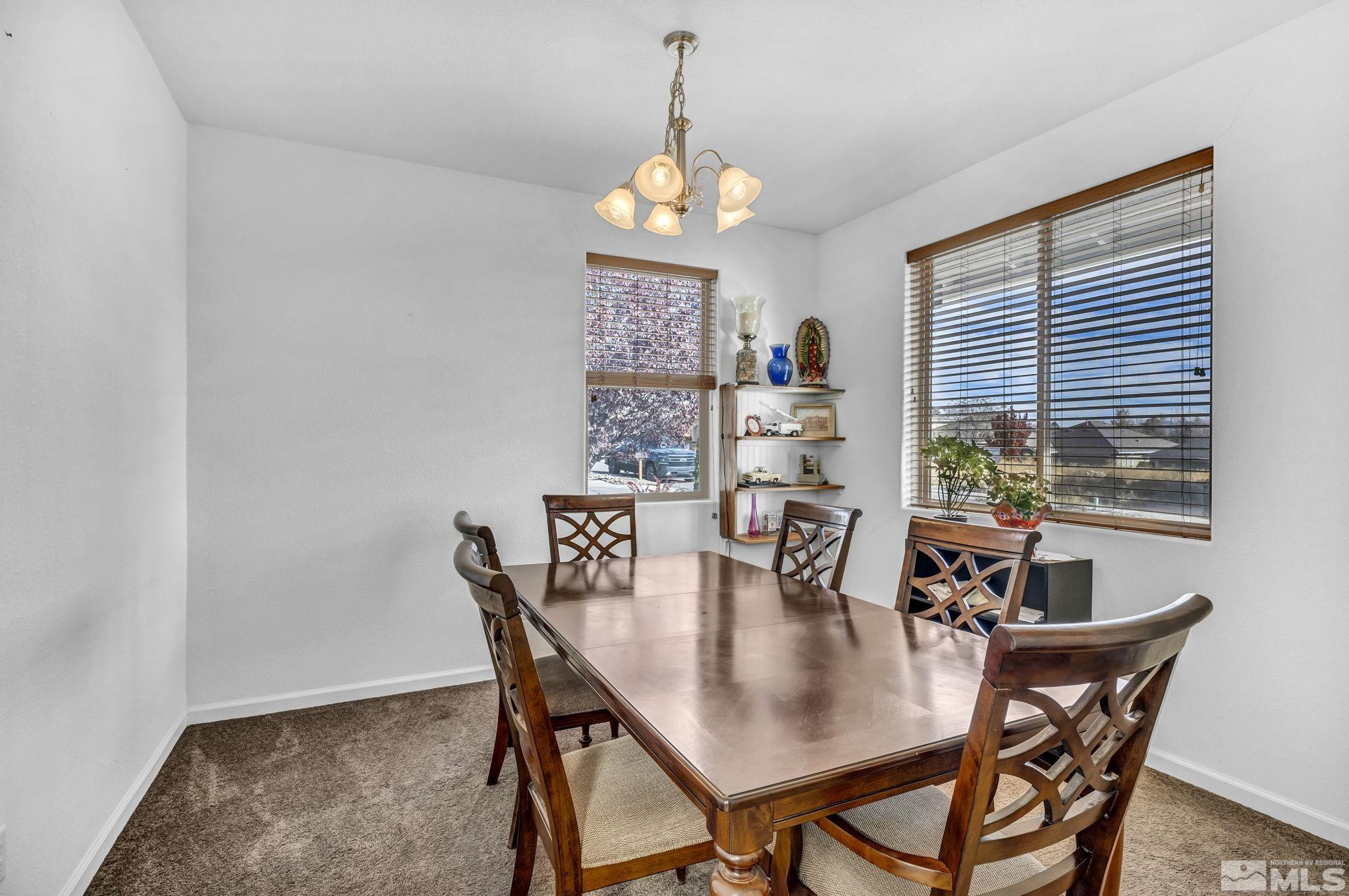 2705 Gulling Court Reno, NV 89503 - Photo 13 of 40 a dining room with furniture and window