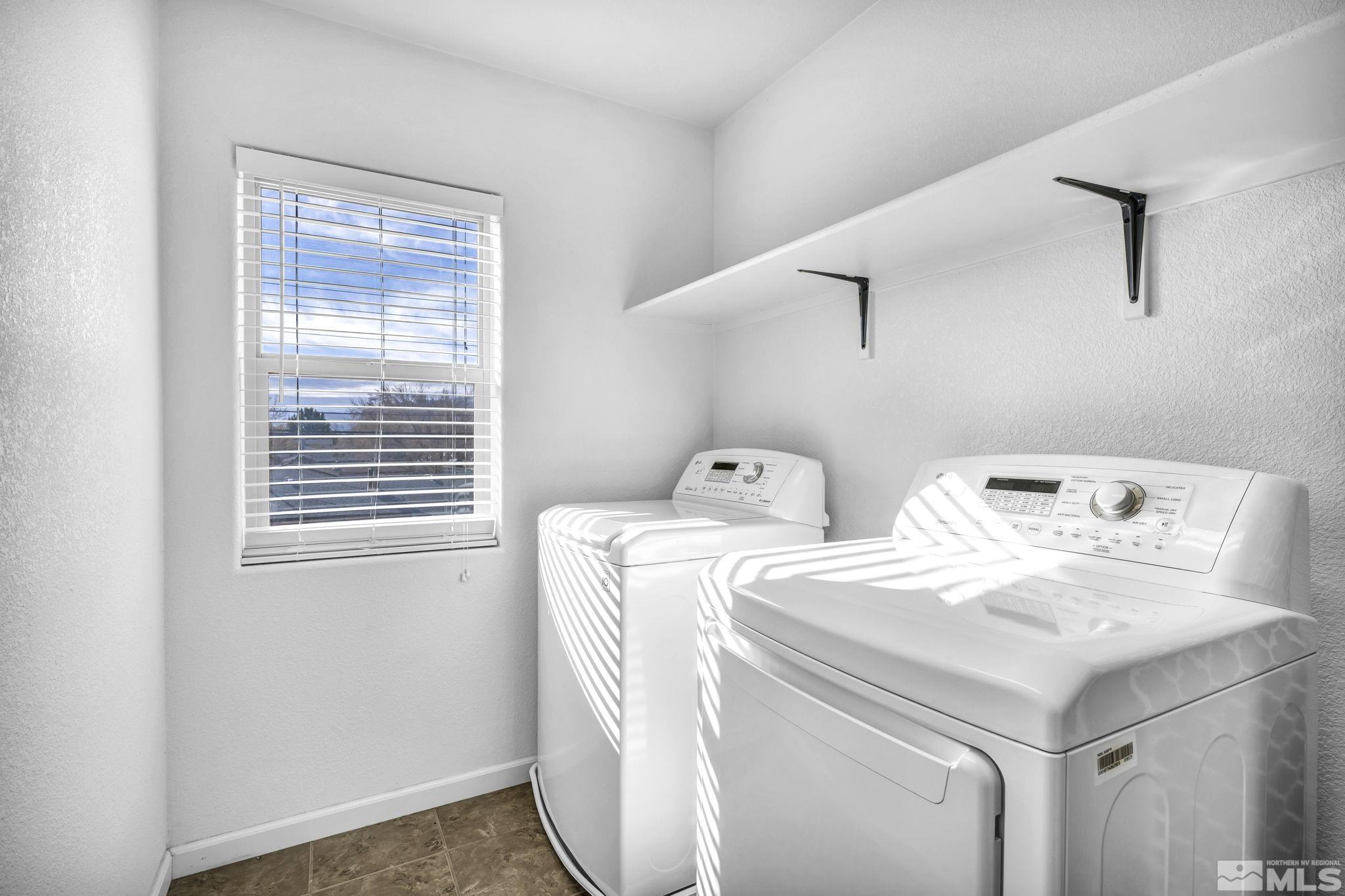 2705 Gulling Court Reno, NV 89503 - Photo 17 of 40 a utility room with dryer and washer