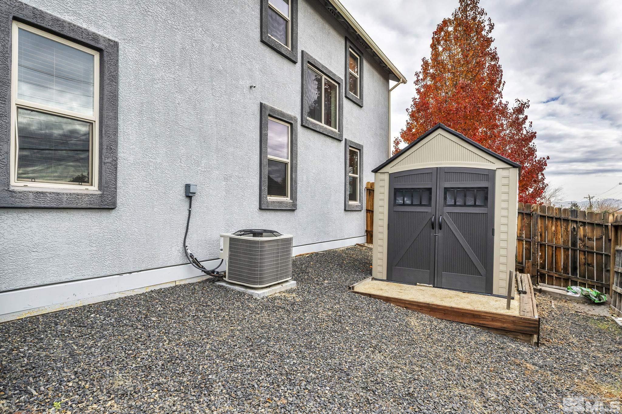 2705 Gulling Court Reno, NV 89503 - Photo 21 of 40 a front view of a house with a yard