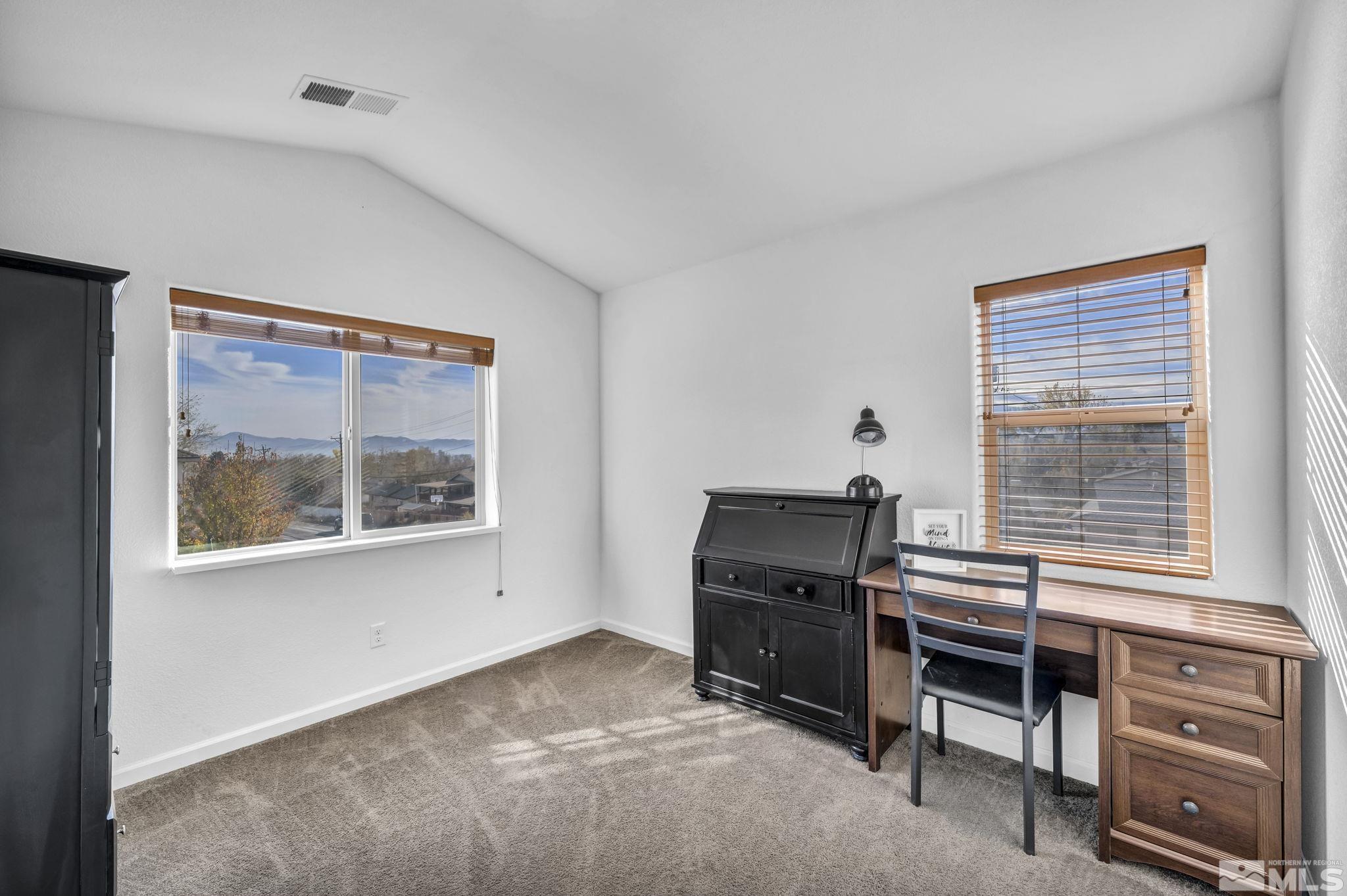 2705 Gulling Court Reno, NV 89503 - Photo 33 of 40 a view of a workspace with furniture and a window