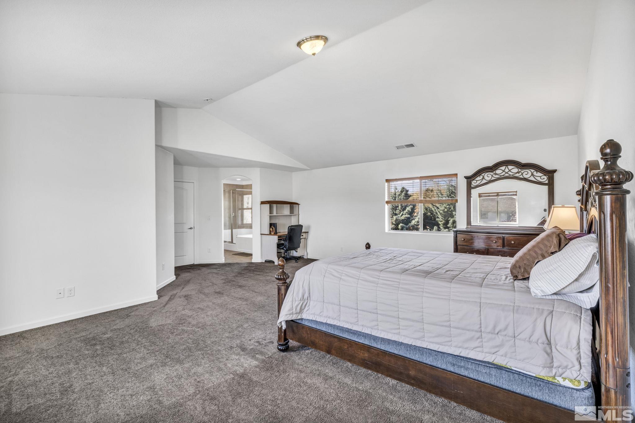 2705 Gulling Court Reno, NV 89503 - Photo 39 of 40 a bedroom with a bed and a window