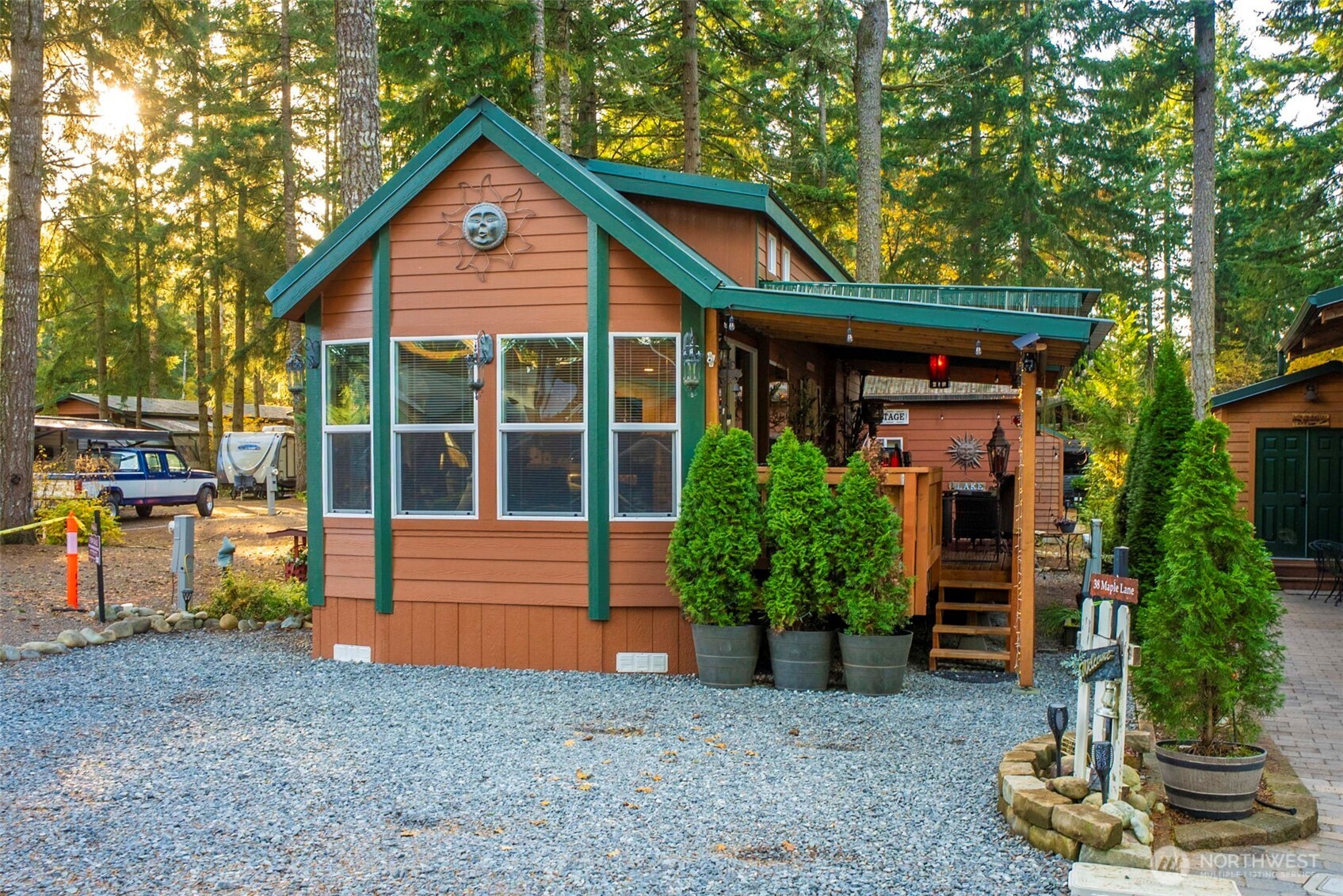a front view of a house with garden