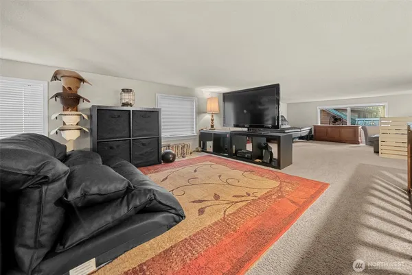 a bedroom with a bed and furniture