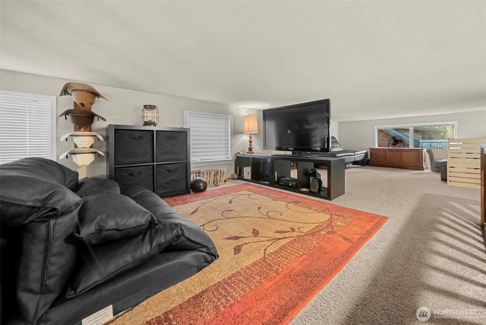 1546 Reservation Road Southeast, Unit 218 Olympia, WA 98513 - Photo 17 of 40 a bedroom with a bed and furniture